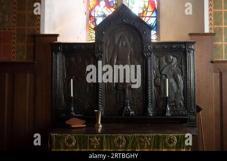 Die geschnitzten hölzernen Reredos, St. Thomas`s Church, Catthorpe, Leicestershire, England, Großbritannien Stockfoto